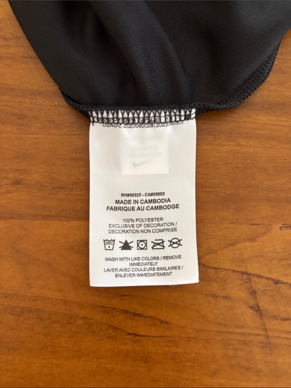 Nike Men’s Dry-fit Black Polo with White Swoosh - Picture 6 of 6
